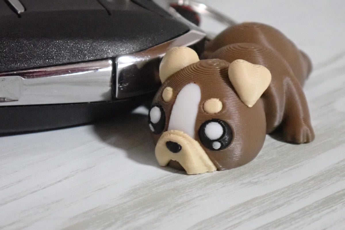 Süßer Flexi-Hund Schlüsselanhänger - Bewegliches 3D-Druck Fidget Toy & Taschenanhänger