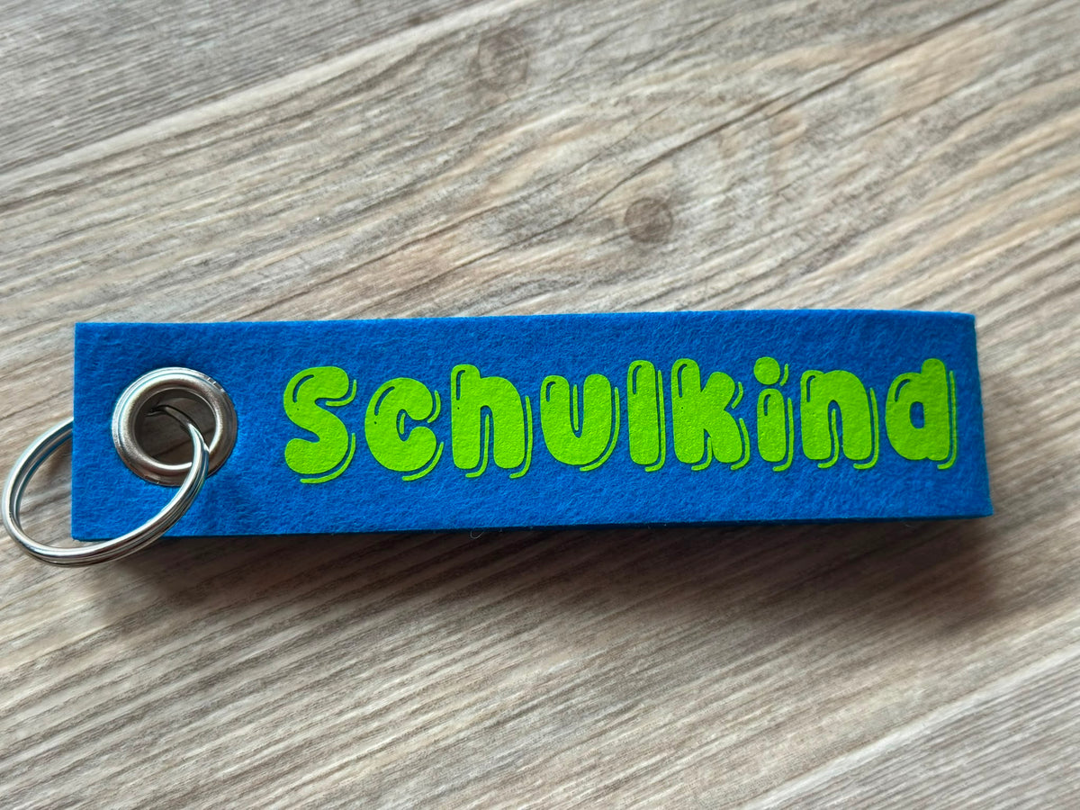 Personalisierter Schlüsselanhänger aus Filz mit Name oder  Wunschtext. Individueller Taschenanhänger als Geschenk.