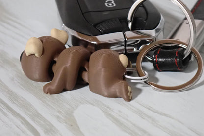 Süßer Flexi-Hund Schlüsselanhänger - Bewegliches 3D-Druck Fidget Toy & Taschenanhänger