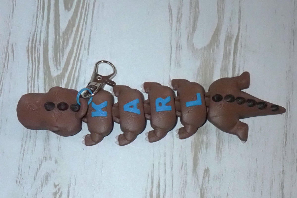 Personalisierter T-Rex Schlüsselanhänger - Flexibler 3D-Druck - Dino mit Wunschnamen
