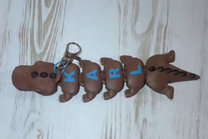 Personalisierter T-Rex Schlüsselanhänger - Flexibler 3D-Druck - Dino mit Wunschnamen