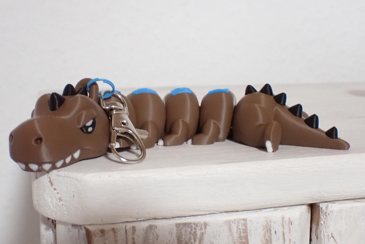 Personalisierter T-Rex Schlüsselanhänger - Flexibler 3D-Druck - Dino mit Wunschnamen