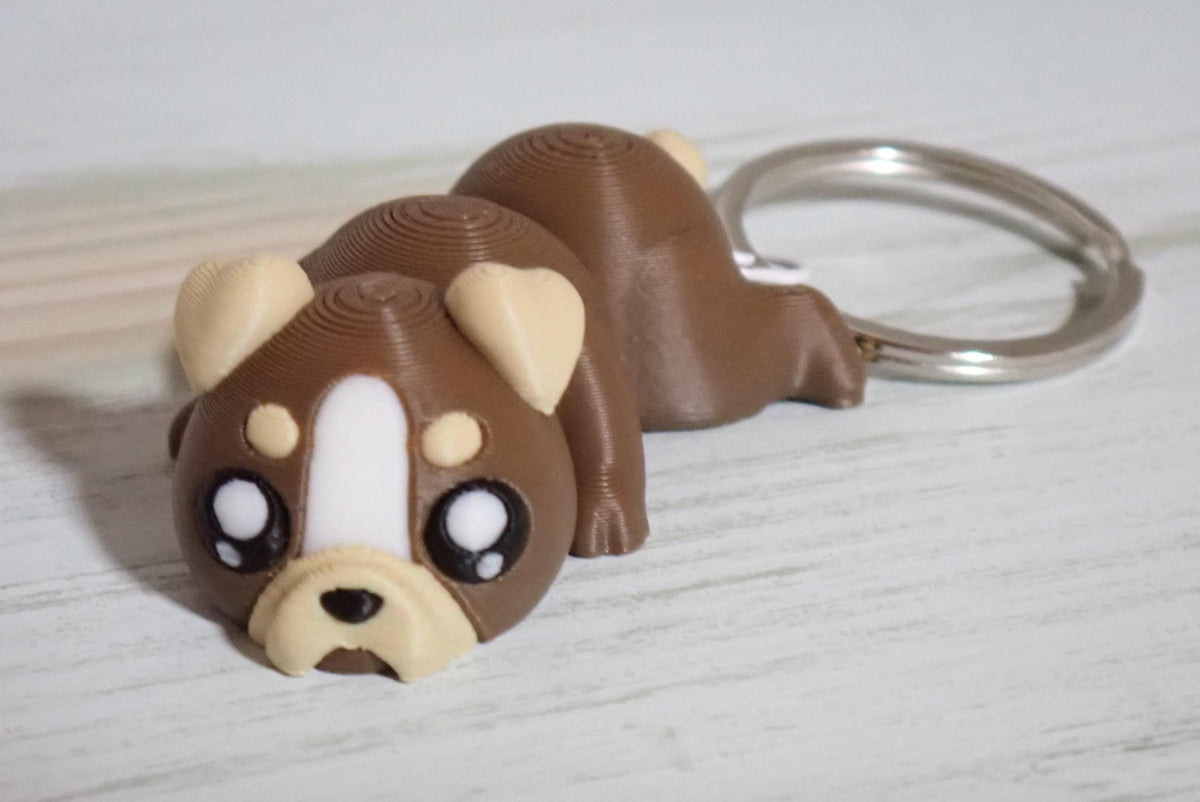 Süßer Flexi-Hund Schlüsselanhänger - Bewegliches 3D-Druck Fidget Toy & Taschenanhänger