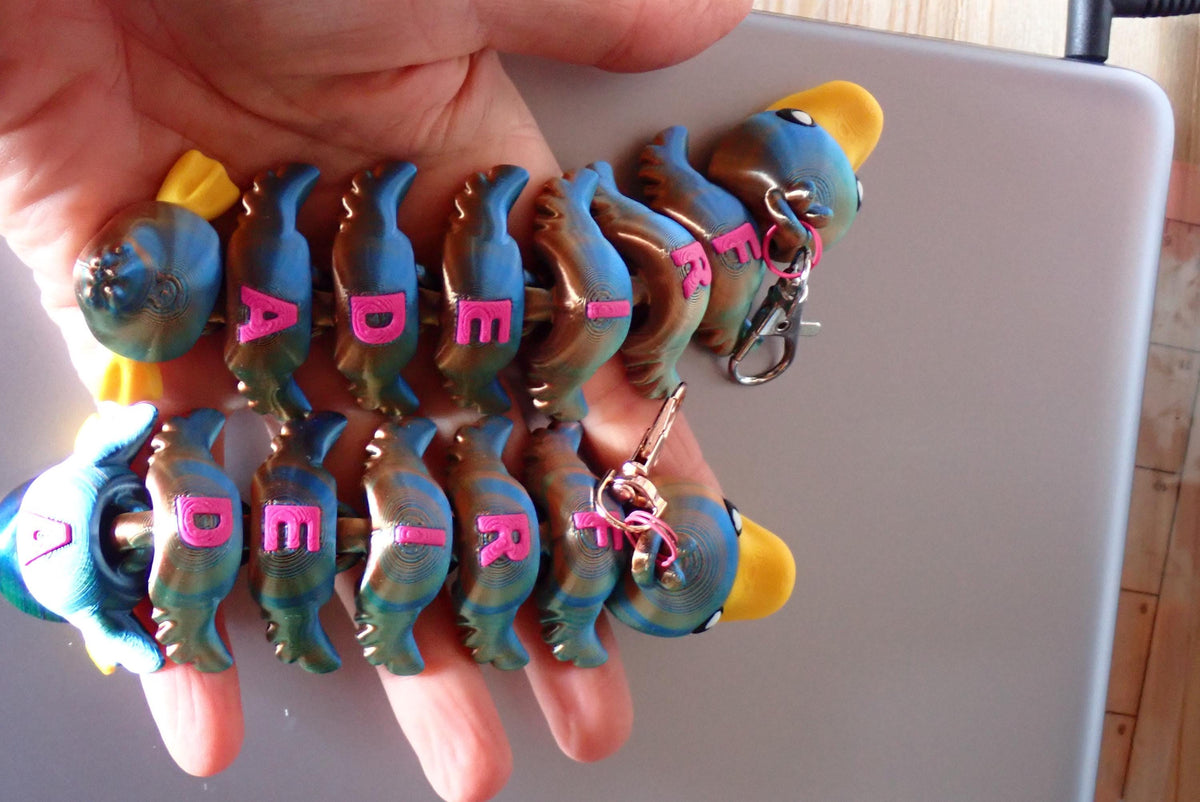 Personalisiertes Enten Fidget Toy mit Namen I 3D gedruckte bewegliche Ente mit Personalisierung I Taschenanhänger Flexi