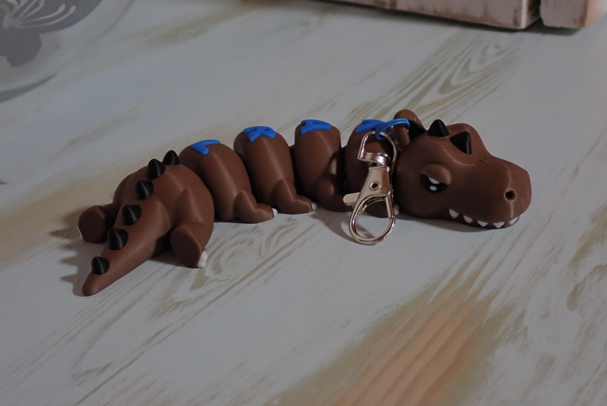Personalisierter T-Rex Schlüsselanhänger - Flexibler 3D-Druck - Dino mit Wunschnamen